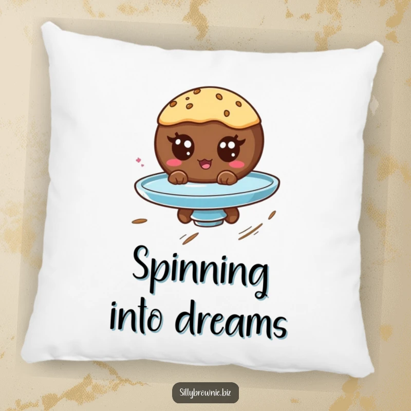 Funny pillow with a round brownie character with googly eyes spinning on a plate, adding a touch of whimsical fun.