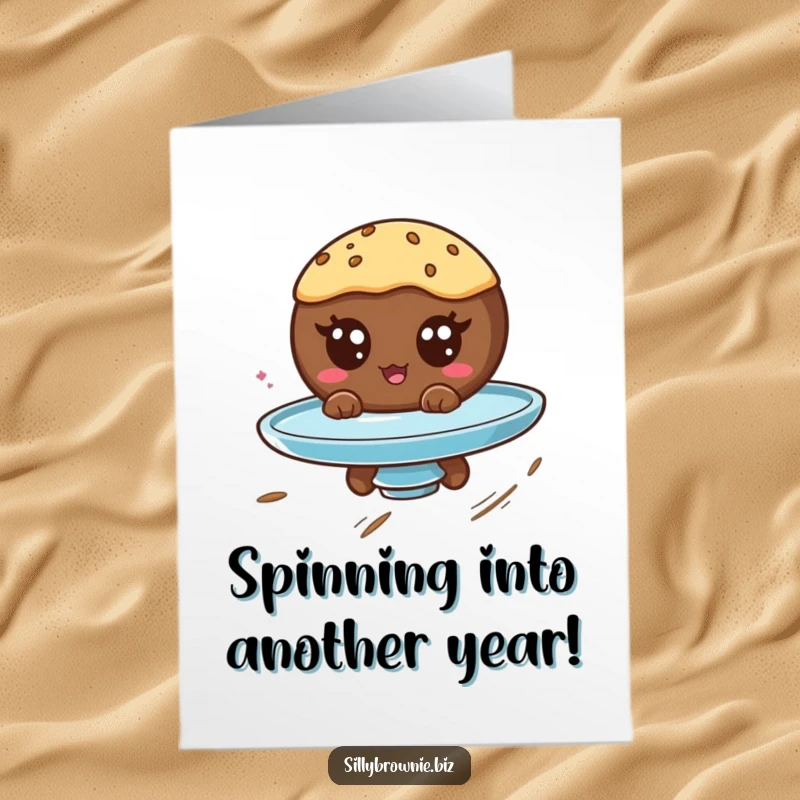 Funny Free Printable Birthday Card: Round brownie with googly eyes gleefully spinning on a plate, pure birthday fun.